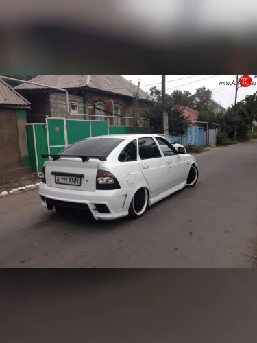 Задний бампер на автомобиль Лекс 