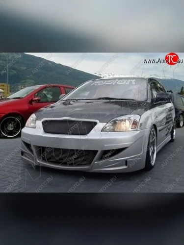 Передний бампер R1 Toyota Corolla E120 хэтчбек 5 дв. дорестайлинг (2000-2004)