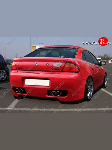 Задний бампер MPV Mazda 323 BA дорестайлинг седан (1994-1996)