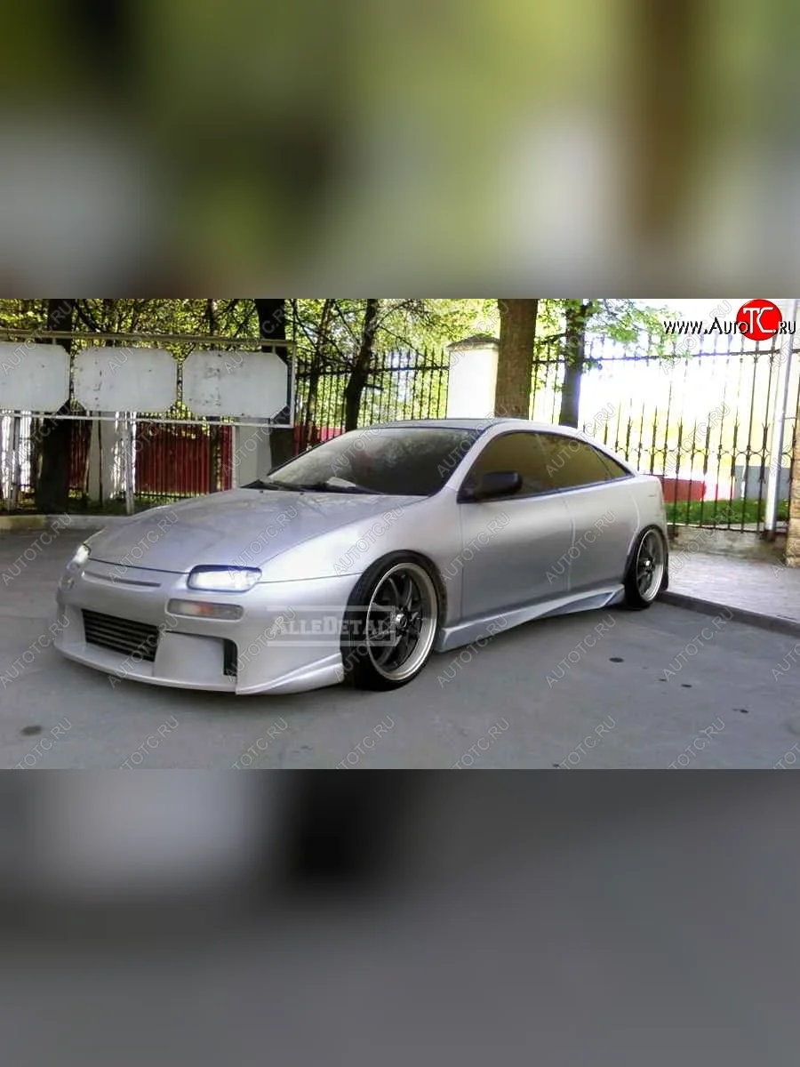 Передний бампер Next Mazda 323 BA дорестайлинг седан (1994-1996)  в Перми Пермском крае