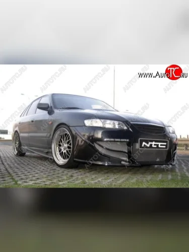 Передний бампер NTC Mazda 626 GF дорестайлинг седан (1997-1999)