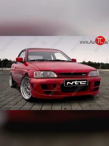 Передний бампер NTC Ford Escort ANL 1-ый рестайлинг универсал (1992-1994)