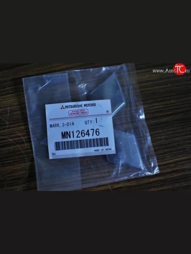 Передняя эмблема Mitsubishi MN 126476 Mitsubishi Galant 9 седан (2004-2009)