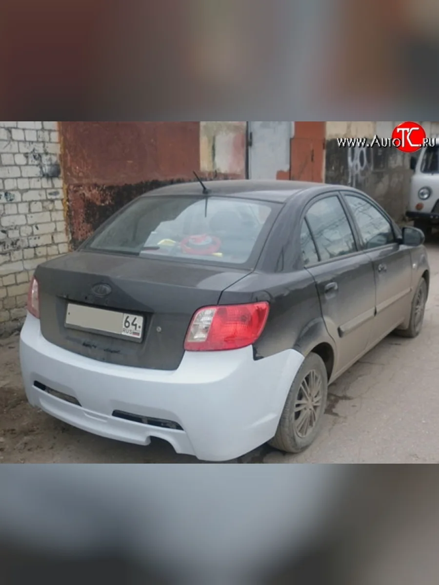 Задний бампер (седан) Ixion KIA Rio 2 JB дорестайлинг седан (2005-2009) (Неокрашенный)  в Керчи Республика Крым
