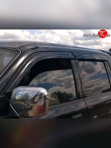 Комплект дефлекторов окон (ветровиков) 4 шт. Russtal Mitsubishi L200 3 K6T-K7T дорестайлинг (1996-2005)