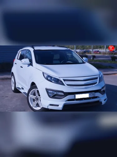 Накладка на передний бампер JSW Style KIA Sportage  3 SL (2010-2014) дорестайлинг