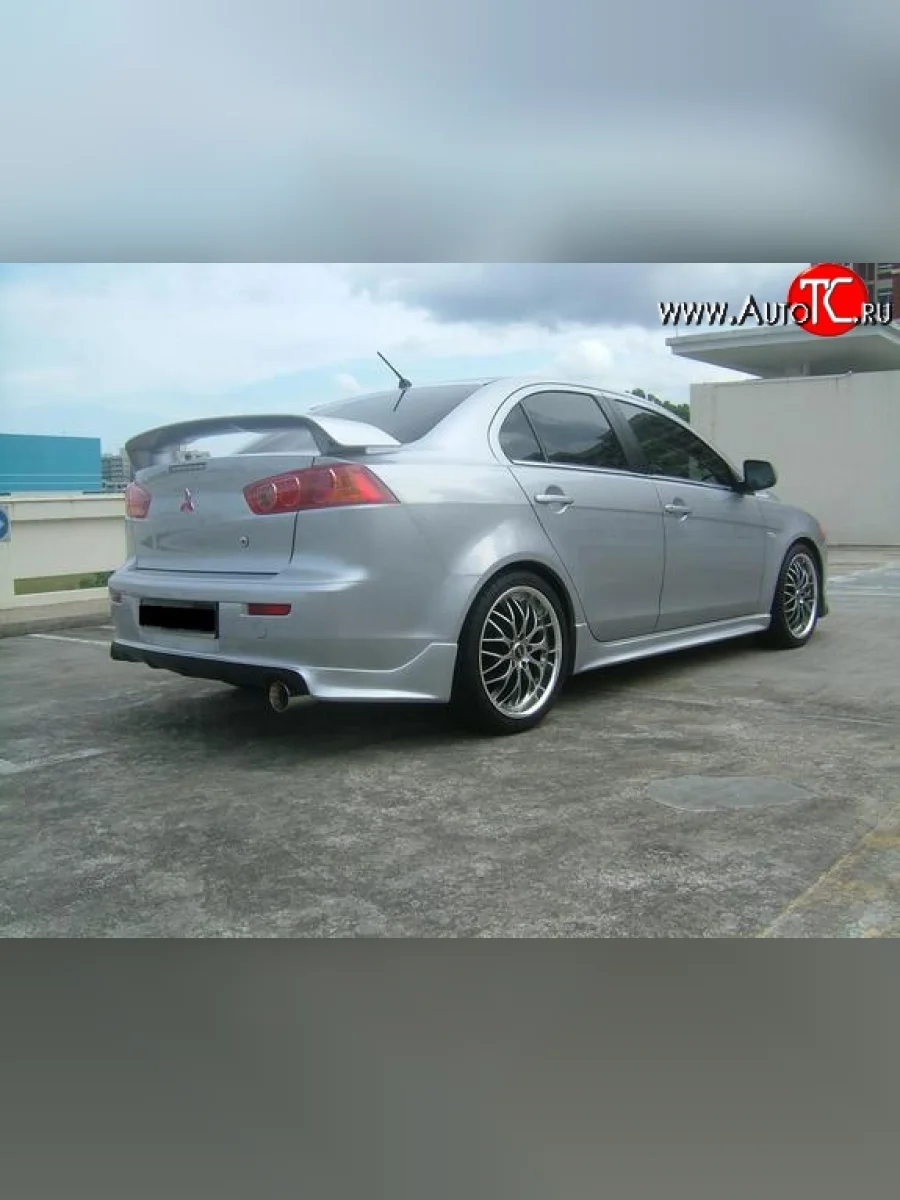 Накладка Zodiak под одинарный выхлоп на задний бампер Mitsubishi Lancer 10 CY седан рестайлинг (2011-2017) (Неокрашенная)  в Керчи Республика Крым