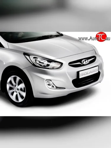 Передний бампер Стандартный (Окрашенный) Hyundai Solaris RBr хэтчбэк дорестайлинг (2010-2014)