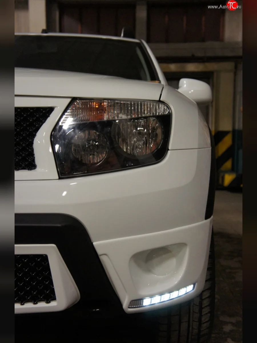 Накладки на боковые части переднего бампера с LED ДХО Drive Renault Duster HS дорестайлинг (2010-2015) (Неокрашенная)  в Керчи Республика Крым