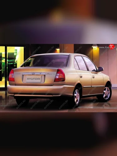 Задний бампер Стандартный Hyundai Accent 2 LC седан дорестайлинг (ТагАЗ) (1999-2012)
