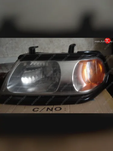 Левая фара DEPO (под корректор, чёрная рамка) Mitsubishi Pajero Sport PA дорестайлинг (1996-2004)