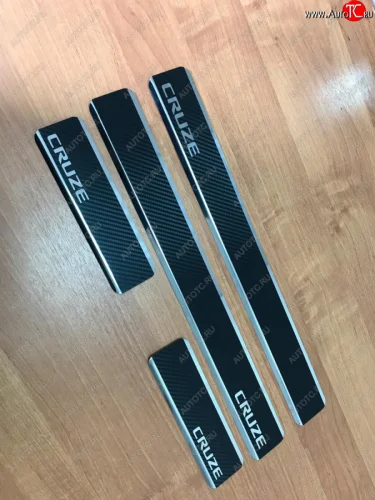 Накладки порожков салона INOX (нержавеющая сталь + карбон) Chevrolet Cruze HR51S,HR81S хэтчбек (Япония) (2001-2008)