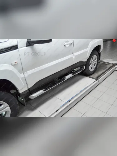 Защита порогов (с накладками, Ø63 мм) Petroil Tuning (окраска в серебристый (Искра)) Лада ВАЗ 2123 (Нива Шевроле) - Нива Трэвел