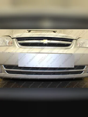  Зимняя заглушка решетки радиатора (2 части) Стрелка11 (черная) Chevrolet Lacetti  седан (2002-2013)