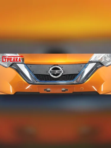 Зимняя заглушка решетки радиатора на стяжке (Японская сборка) Стрелка11 (черная) Nissan Note 2 E12 рестайлинг (2016-2020)