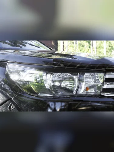 Накладки на передние фары (реснички) Русская Артель (глянец под покраску) Toyota Hilux  AN120 (2017-2020) 1-ый рестайлинг