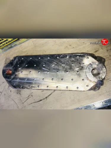 Радиатор масляный теплообменник FAW CA6DM2 J6 FAW 1013010-81d