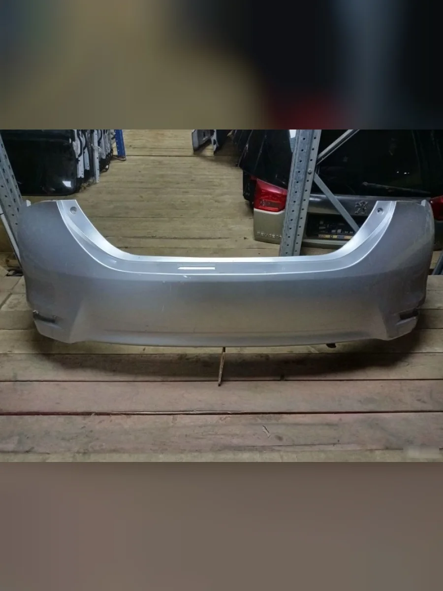 Бампер задний DAR (окрашенный) Toyota Corolla E180 дорестайлинг (2013-2016) (Серебристый металлик (Ultra silver 1F7))  с доставкой в г. Керчь