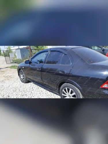 Пластиковые накладки порогов Фанат Тюнинг Nissan Almera Classic  седан (2006-2013) B10