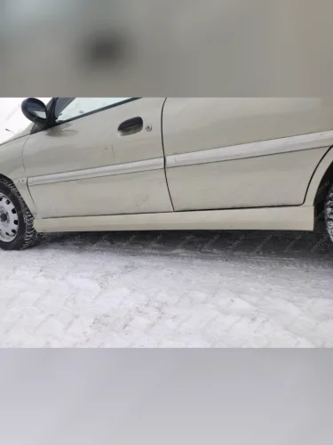 Пластиковые накладки порогов Фанат Тюнинг KIA Rio  1 DC (2000-2005) дорестайлинг седан, рестайлинг седан