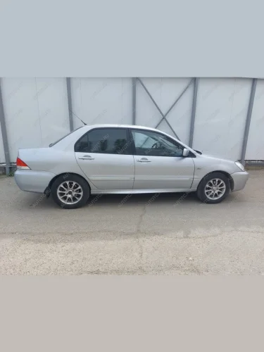 Пластиковые накладки порогов Фанат Тюнинг Mitsubishi Lancer  9 CS (2000-2009) седан дорестайлинг, седан 1-ый рестайлинг, универсал 1-ый рестайлинг, седан 2-ой рестайлинг, универсал 2-ой рестайлинг